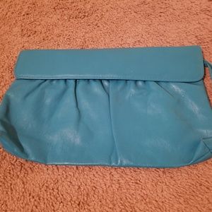 Blue vintage clutch with white lining